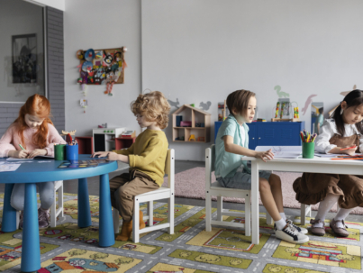 full-shot-people-sitting-chairs-kindergarten